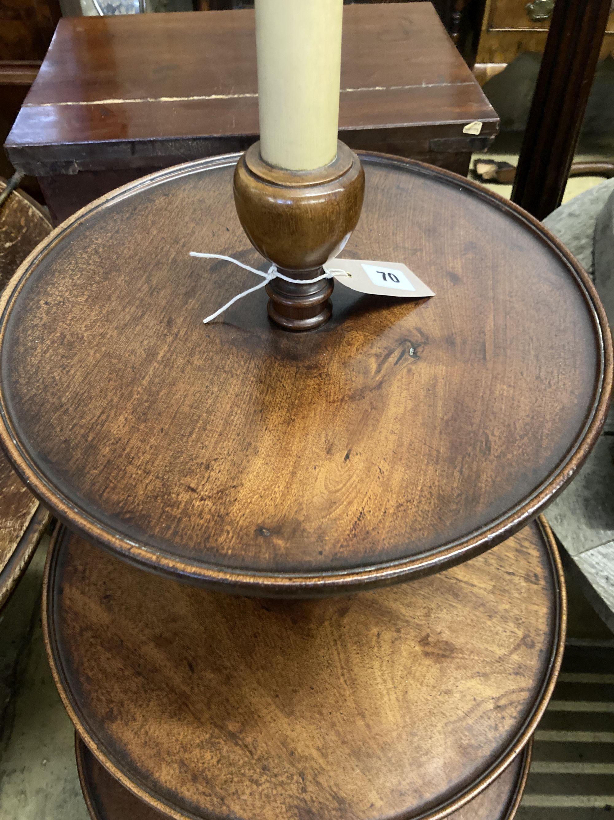 A George III mahogany three tier dumb waiter, converted to a lamp, height 115cm